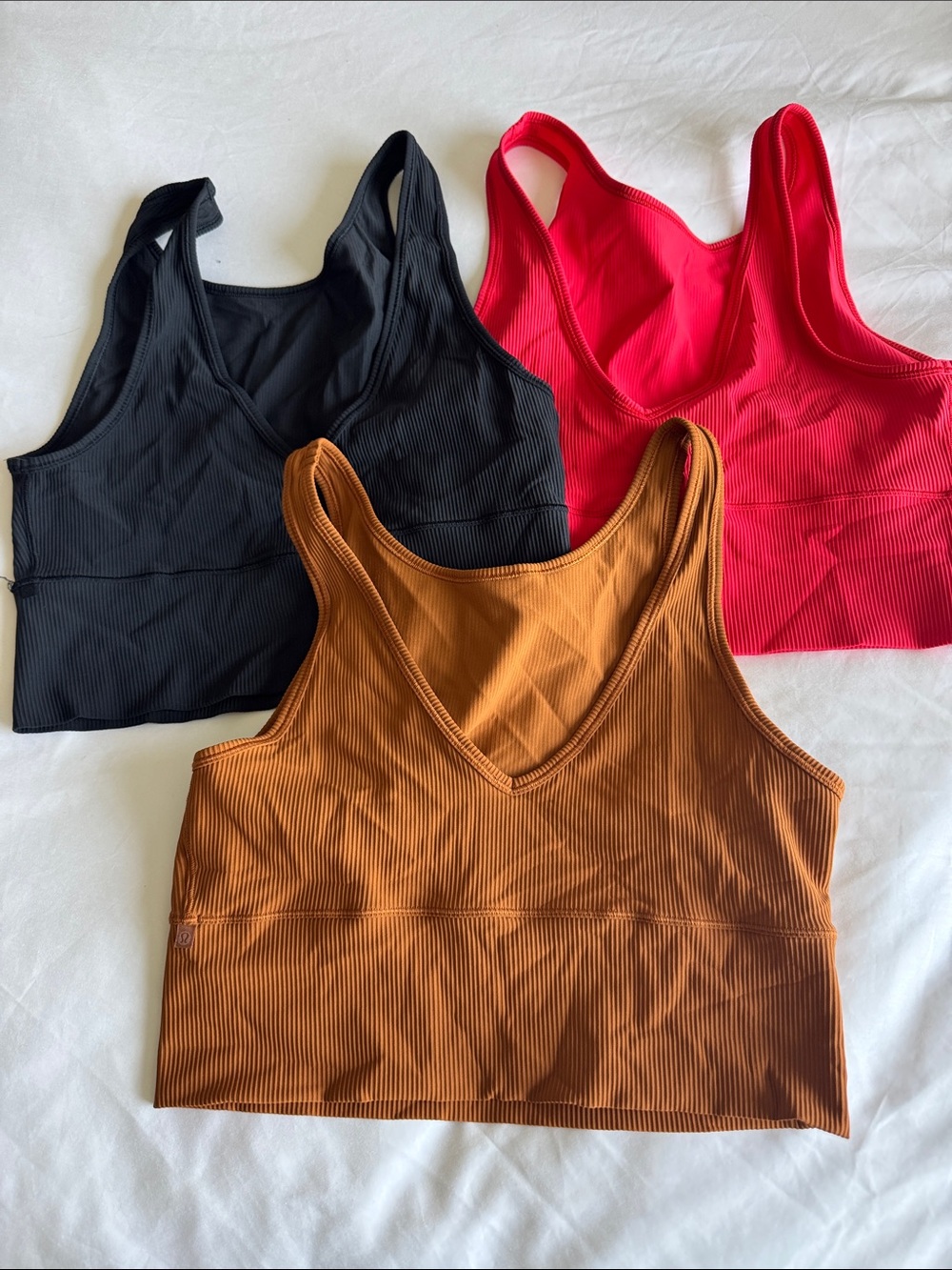 lululemon athletica Ribbed V‑Neck Tank Top — Black, Red, and Rust